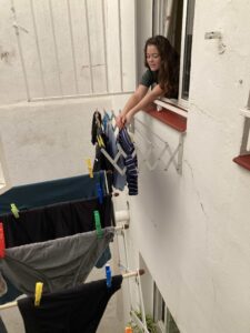 Hanging laundry saves time and money over a dryer